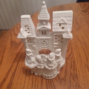 Partylite Christmas Village Carolers decoration holds a tea light